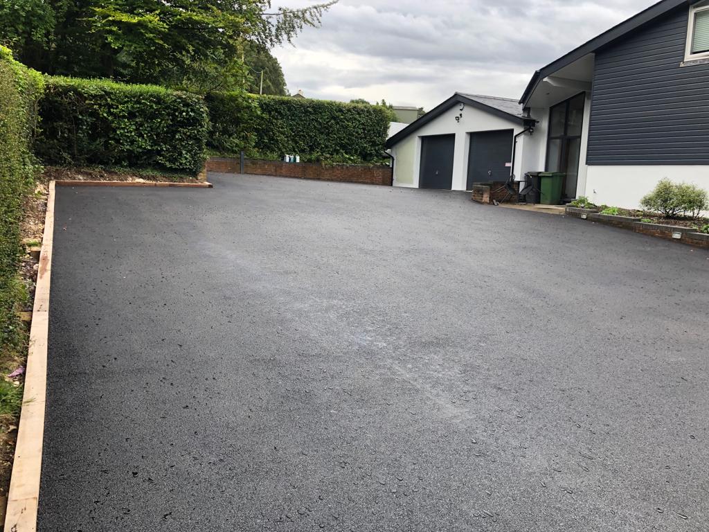 This is a photo of a asphalt driveway which is in the process of being installed by Blayney Road Tek