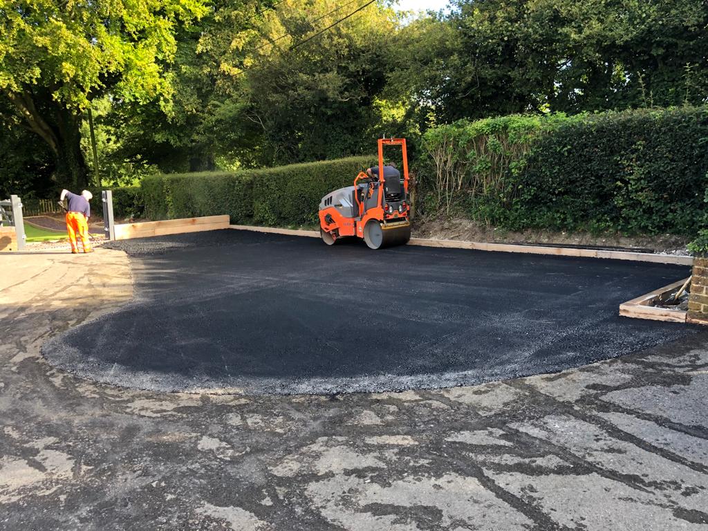 This is a photo of a bitumen driveway which is in the process of being installed by Blayney Road Tek
